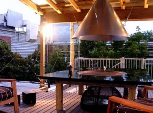 The deck has a fire pit.
