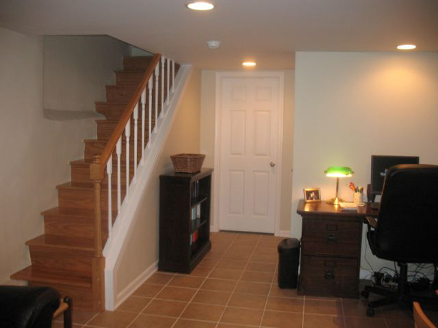 finished basement showing stairs