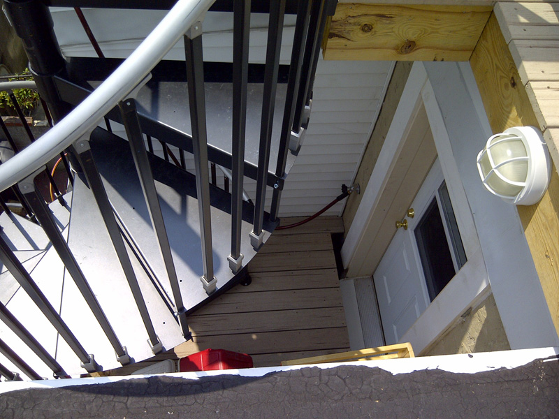 Stairway leading from house to roof deck